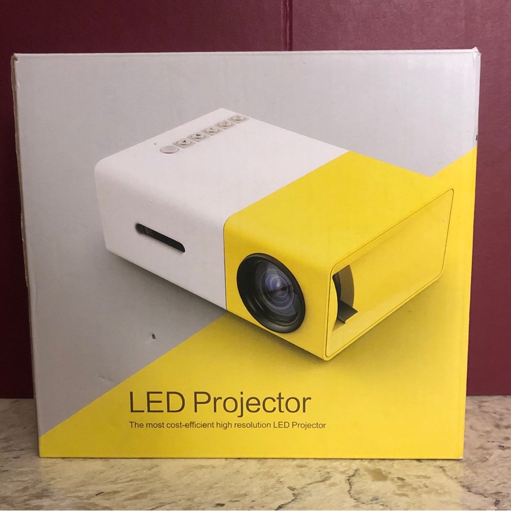 Portable Mini LED Projector LED LCD Mini Video Projector - White/yellow